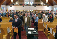 
			
				                                Immaculate Conception Church of the Corpus Christi Parish, West Pittston, was the site of a Veterans Day Mass. Veterans are shown marching into the church with students from Wyoming Area lining the isle with American flags on Sunday, Nov. 10, 2024.
                                 Tony Callaio | For Sunday Dispatch

			
		