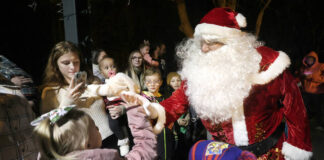 
			
				                                Santa arrives at Dailey Park in West Wyoming and is greeted by a host of youngsters.
                                 Fred Adams | For Times Leader

			
		